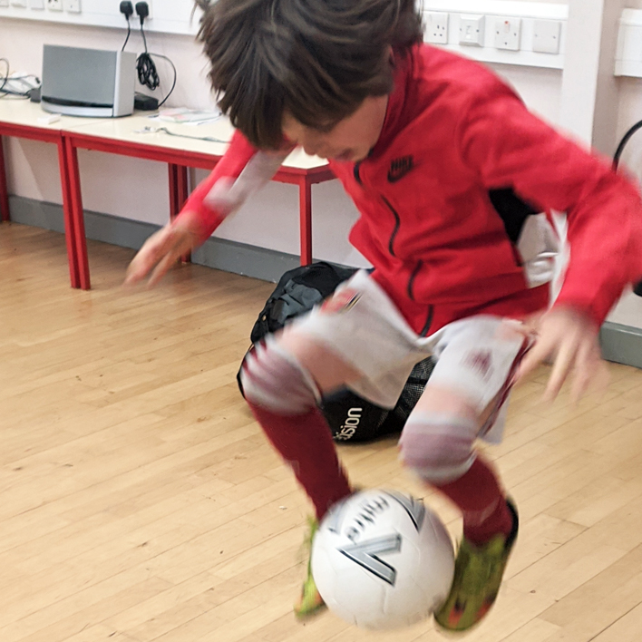 Pupils learn football tricks from record holding freestylers